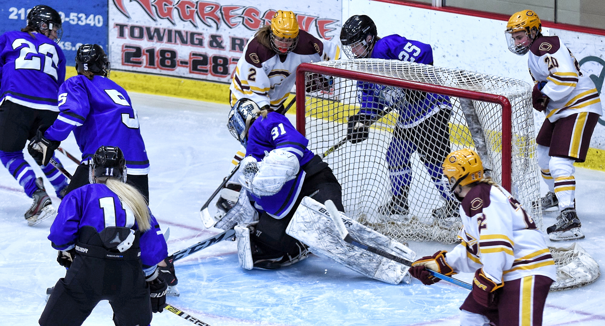 Amanda Flemming (#2) follows the puck slide into the net for the Cobbers' in their 3-1 win over Finlandia.