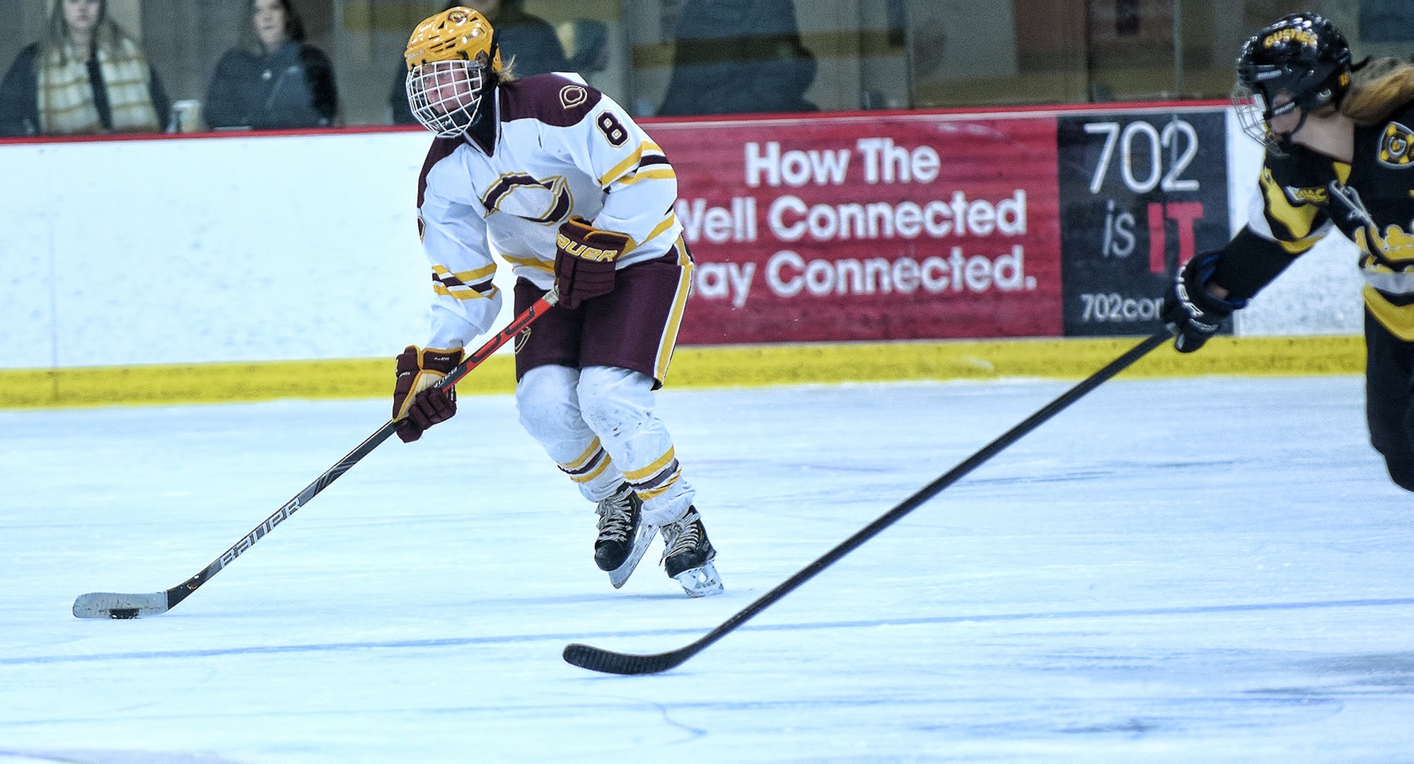 Sophomore defenseman Jordie Egerdahl brings the puck up the ice in the second period in the Cobbers' series finale against #6 Gustavus. Egerdahl had the lone goal for CC in the game.