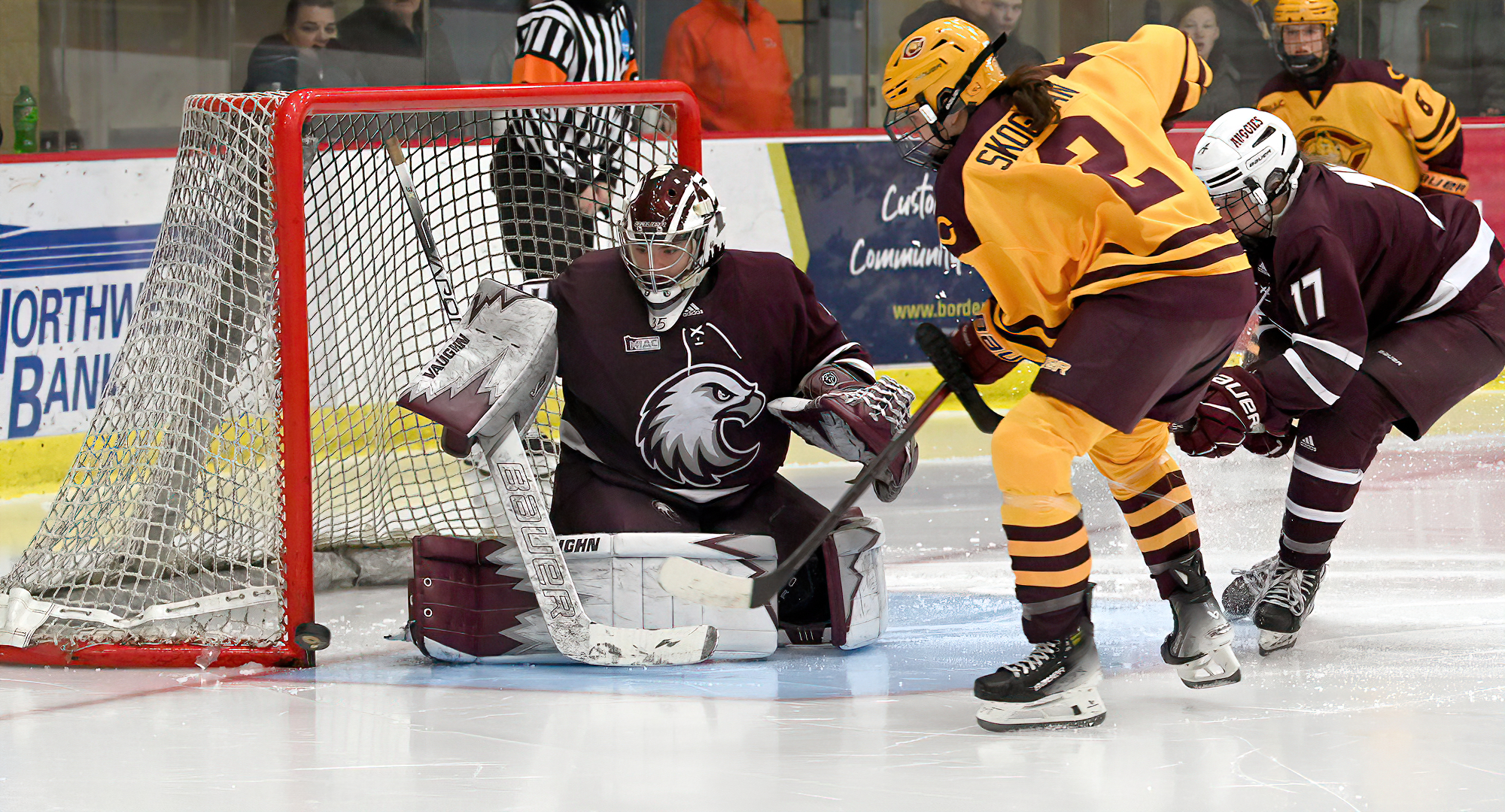 Madilyn Skogman watches the puck hit the post in the third period of the Cobbers' series finale with Augsburg. She had three shots on goal.