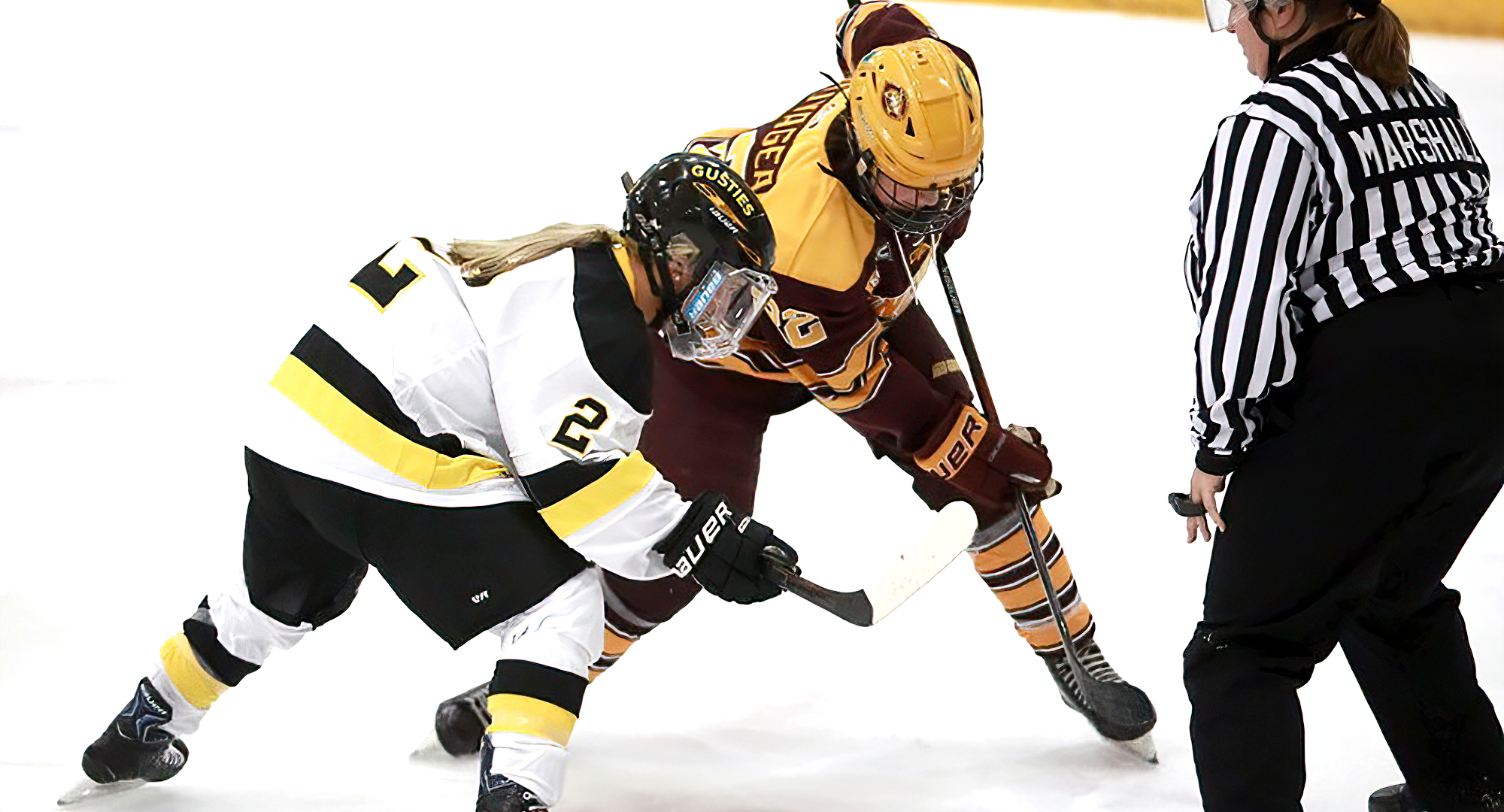 Morgan Sauvageau takes a faceoff in the series opener at Gustavus. She scored the first two goals in the game (Photo courtesy of Gustavus SID)