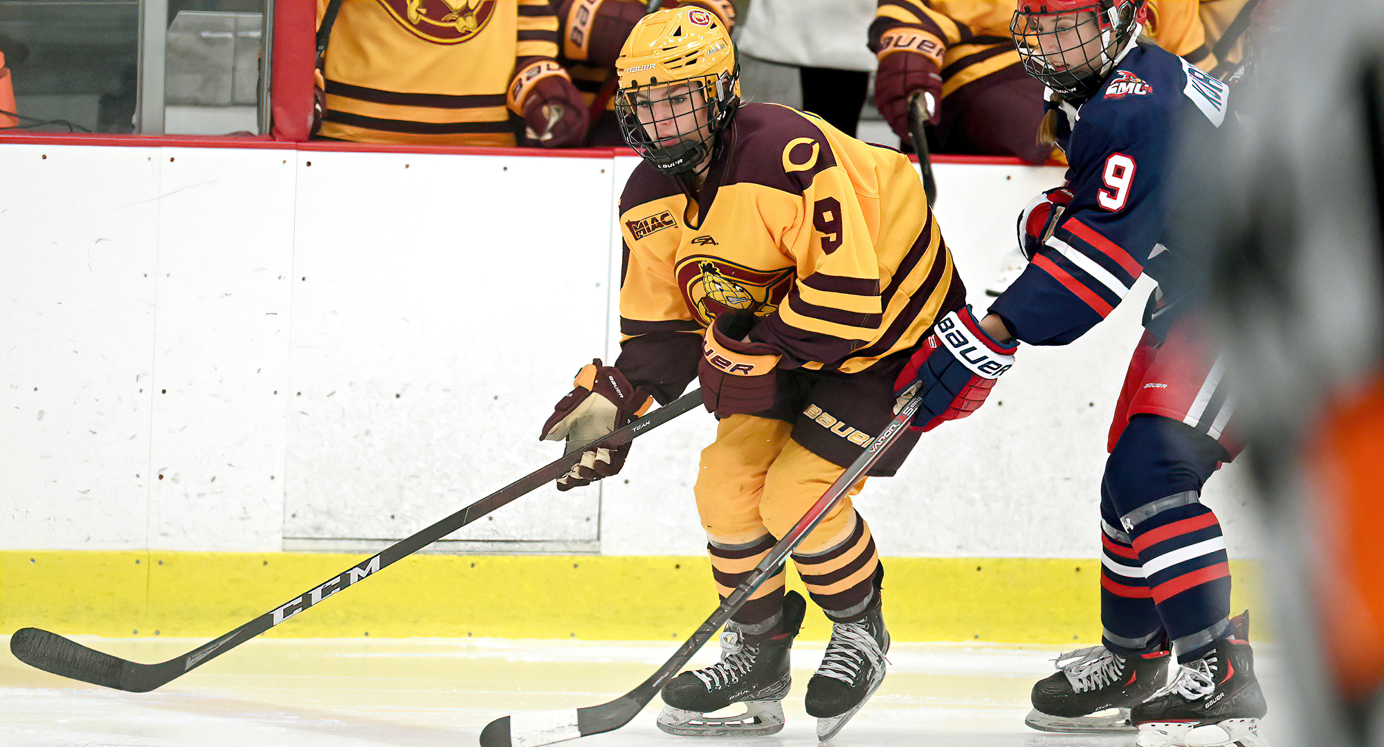 Memphis Mertens goes after a loose puck in the Cobbers' win over St. Mary's. She scored the game-winning goal in the first minute of overtime.