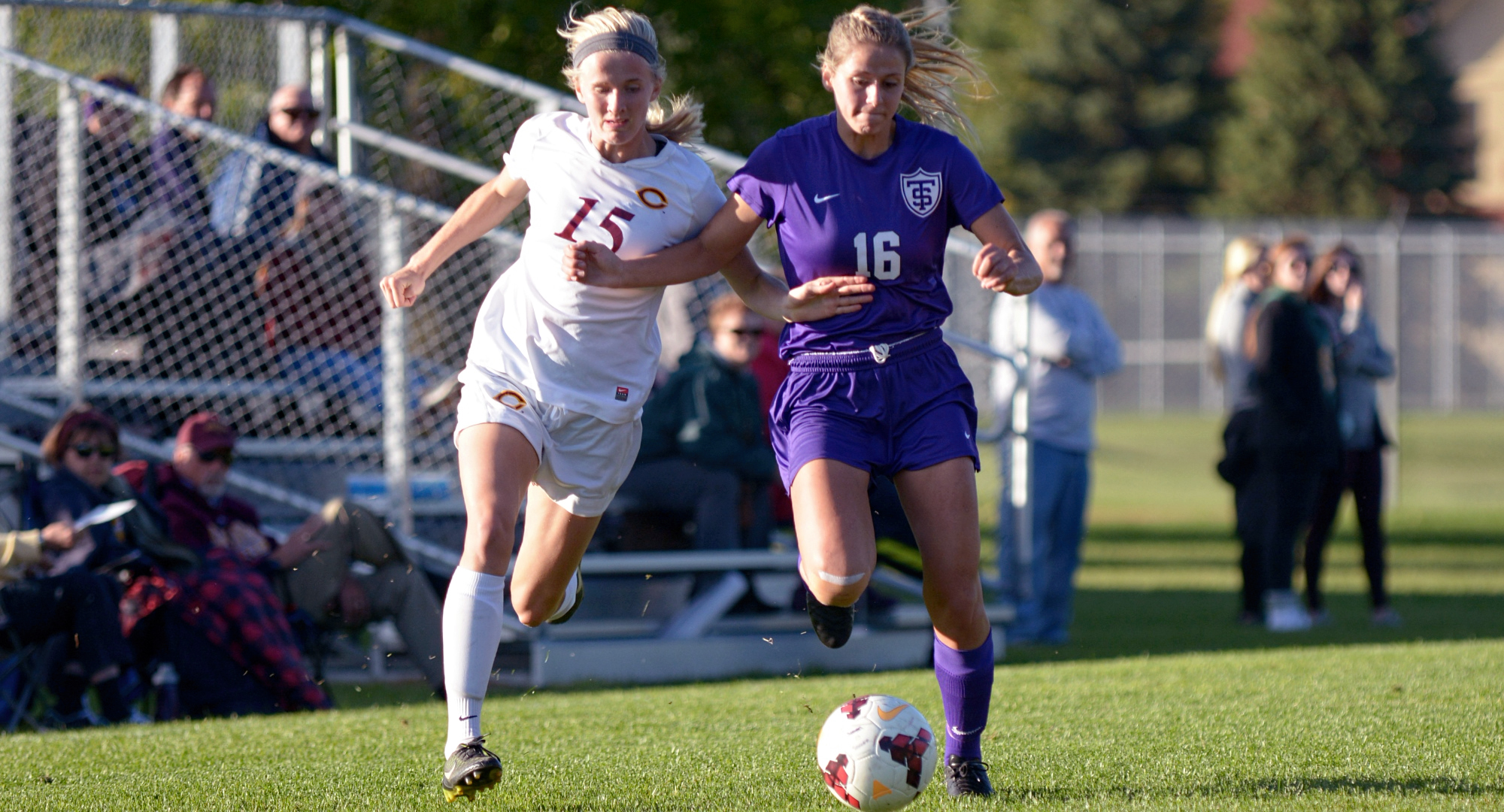 Senior Emily Payne battles for the ball on the right wing during the Cobbers' game with #14 St. Thomas. Payne scored her second goal in the last three games in the 2-1 loss.