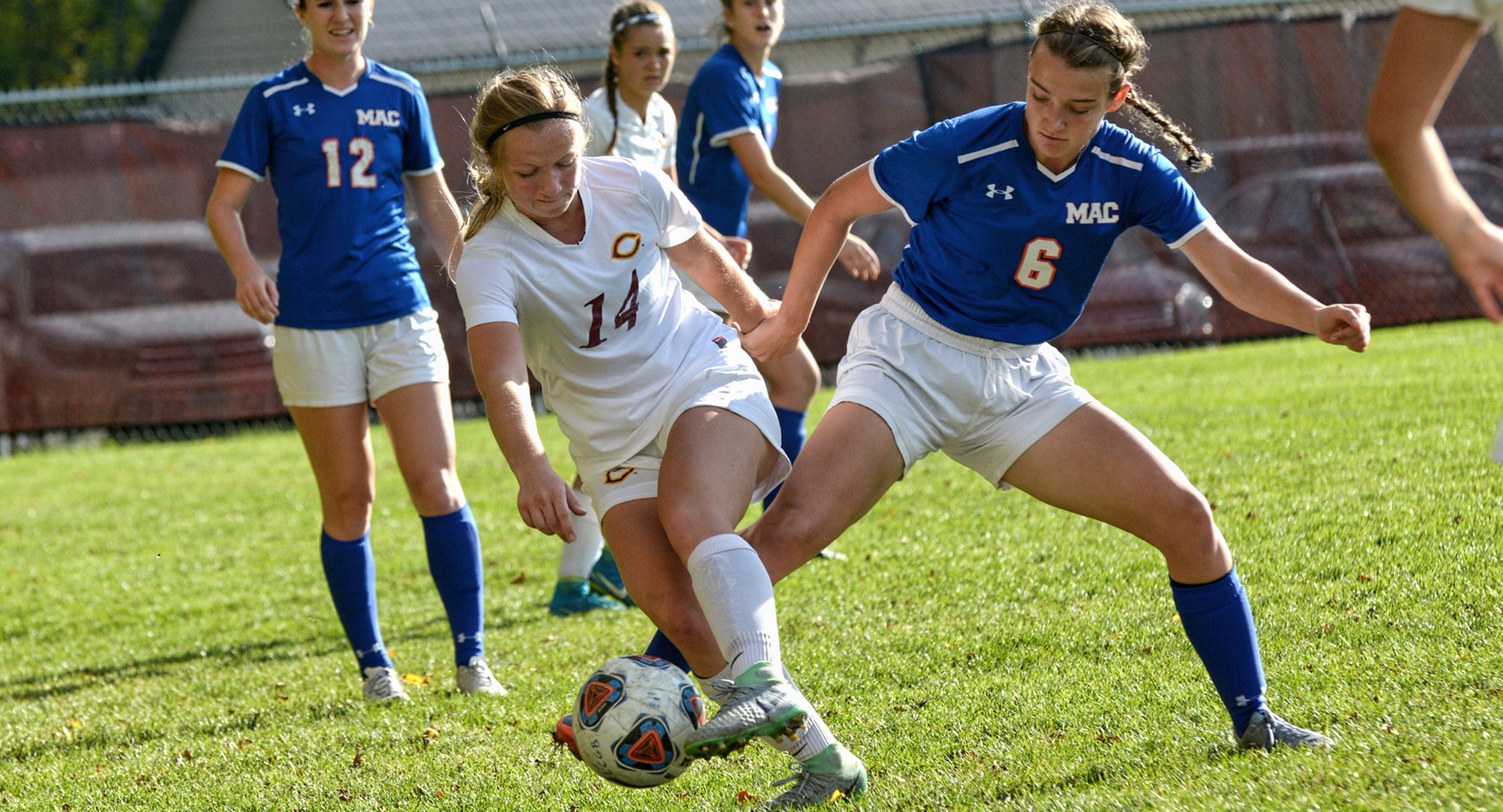 Freshman Klara Beinhorn wins the ball from a Macalester player. Beinhorn scored the game-winning goal with 63 seconds left in the second overtime.