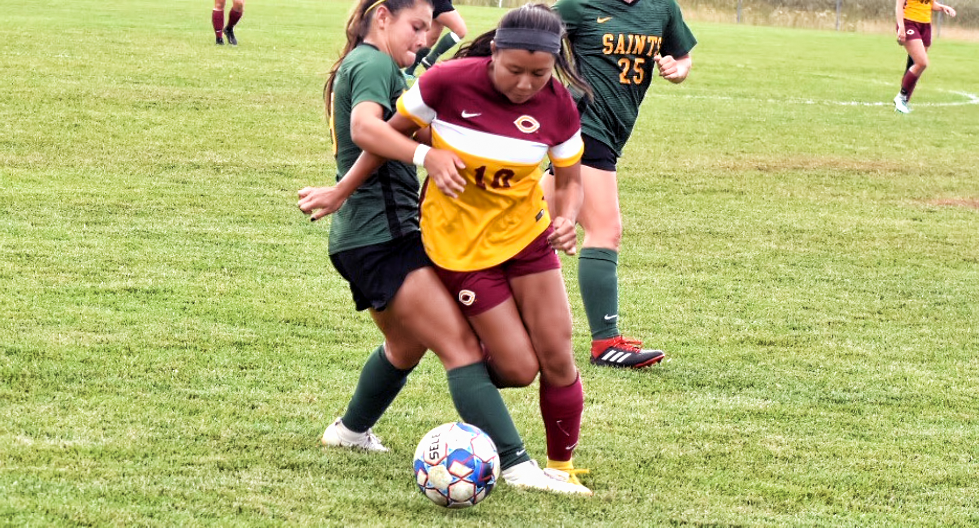 Sophomore Kay Franzese takes control of the ball against a Presentation defender. She scored the game-winning goal which was her first collegiate strike. (Photo courtesy of Vince Arnold)
