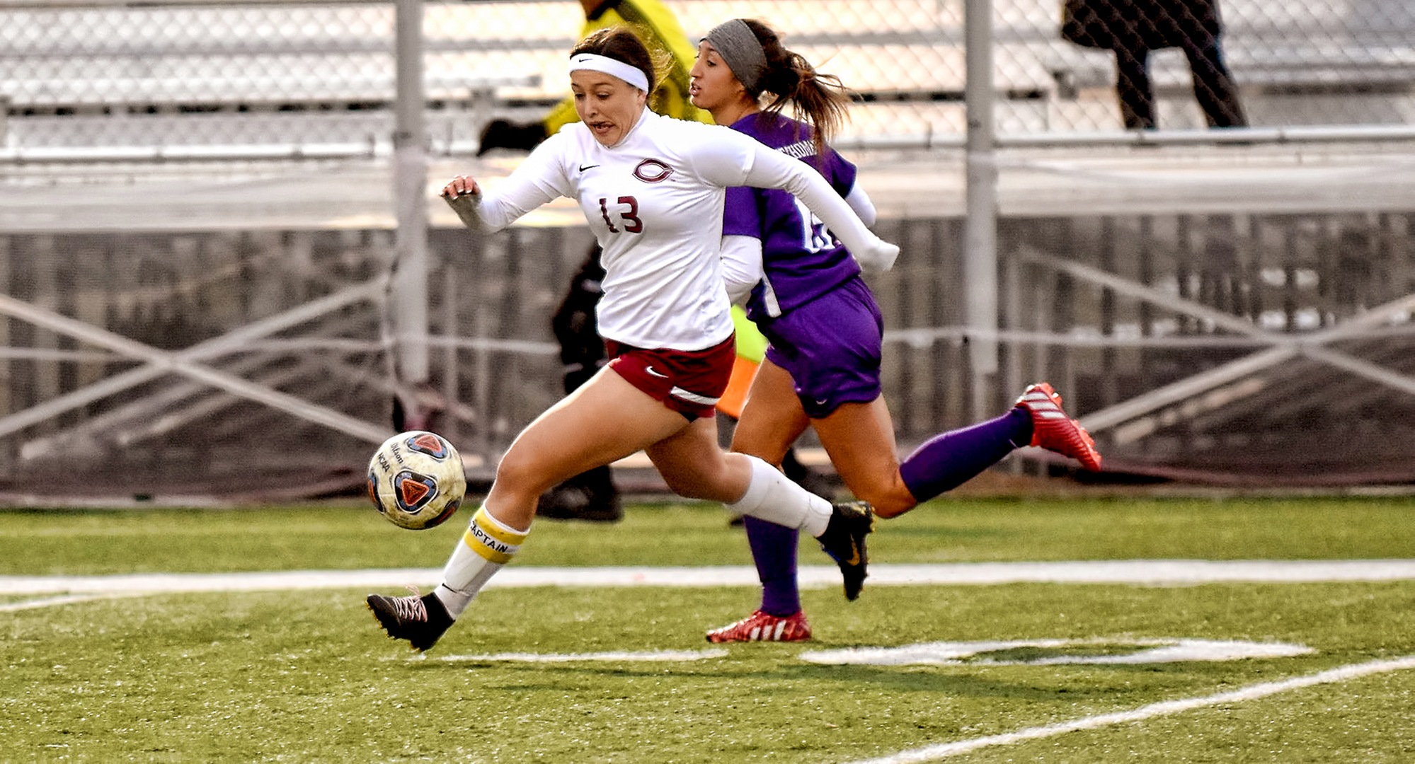 Senior Kalli Baarstad gets control of the ball and heads toward the St. Thomas goal in the first half of the Cobbers' game with the Tommies.