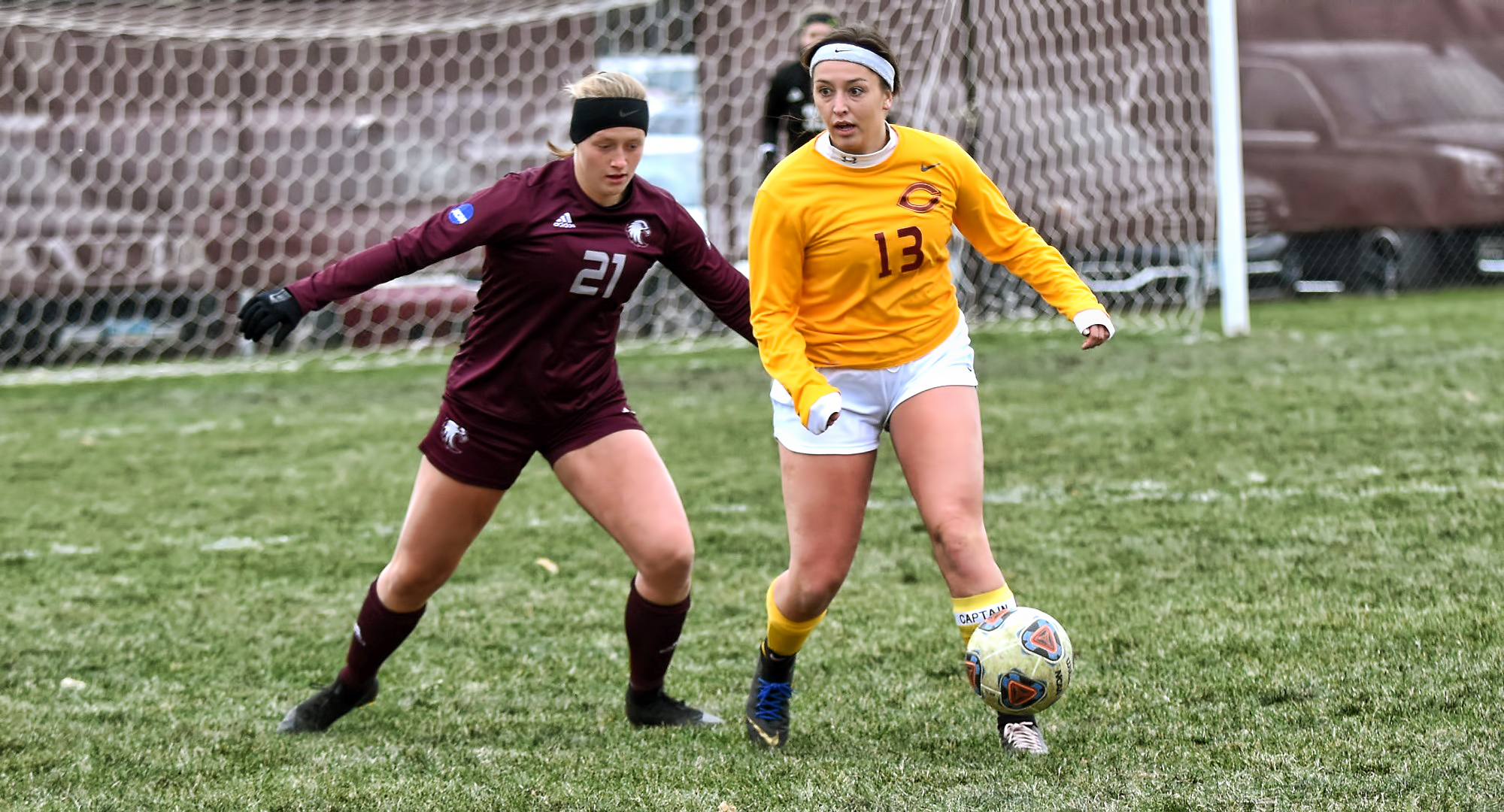 Senior Kalli Baarstad keeps the ball away from an Augsburg defender during the second half of the Cobbers' game with the Auggies. Baarstad led CC with four shots.