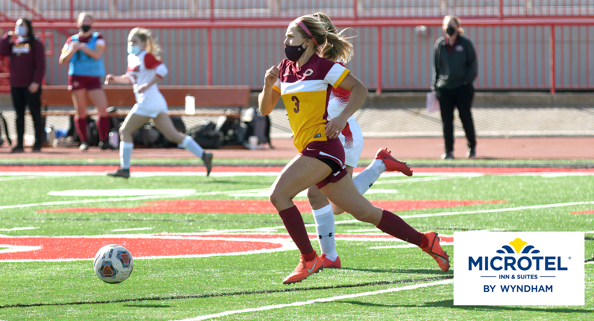 Junior Lauren Tschider brings the ball up the field during the Cobbers' opening game of the spring against MSU Moorhead.