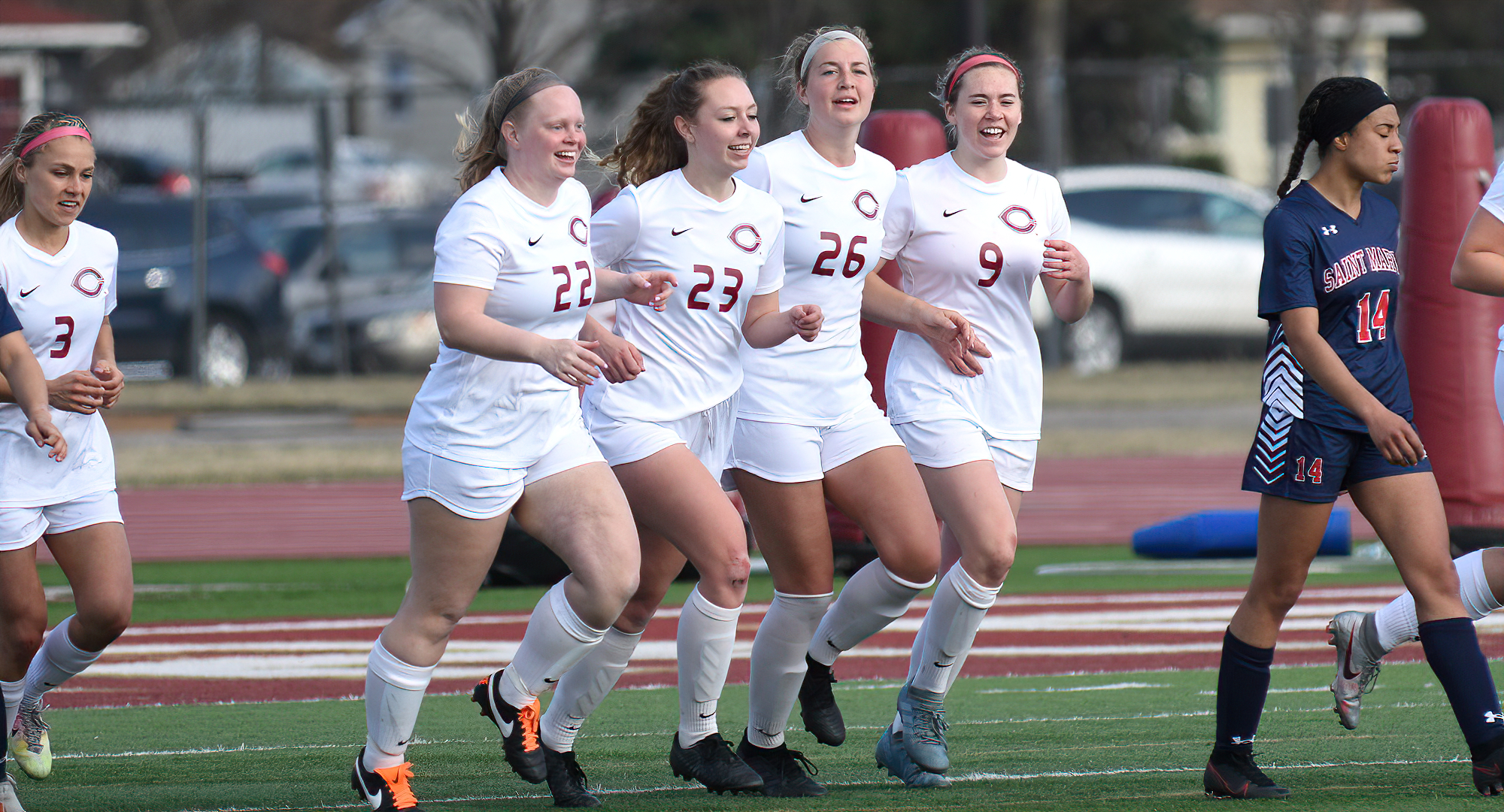 The Cobbers celebrate Samantha Dalsin's (#22) header goal in the second half against St. Mary's.