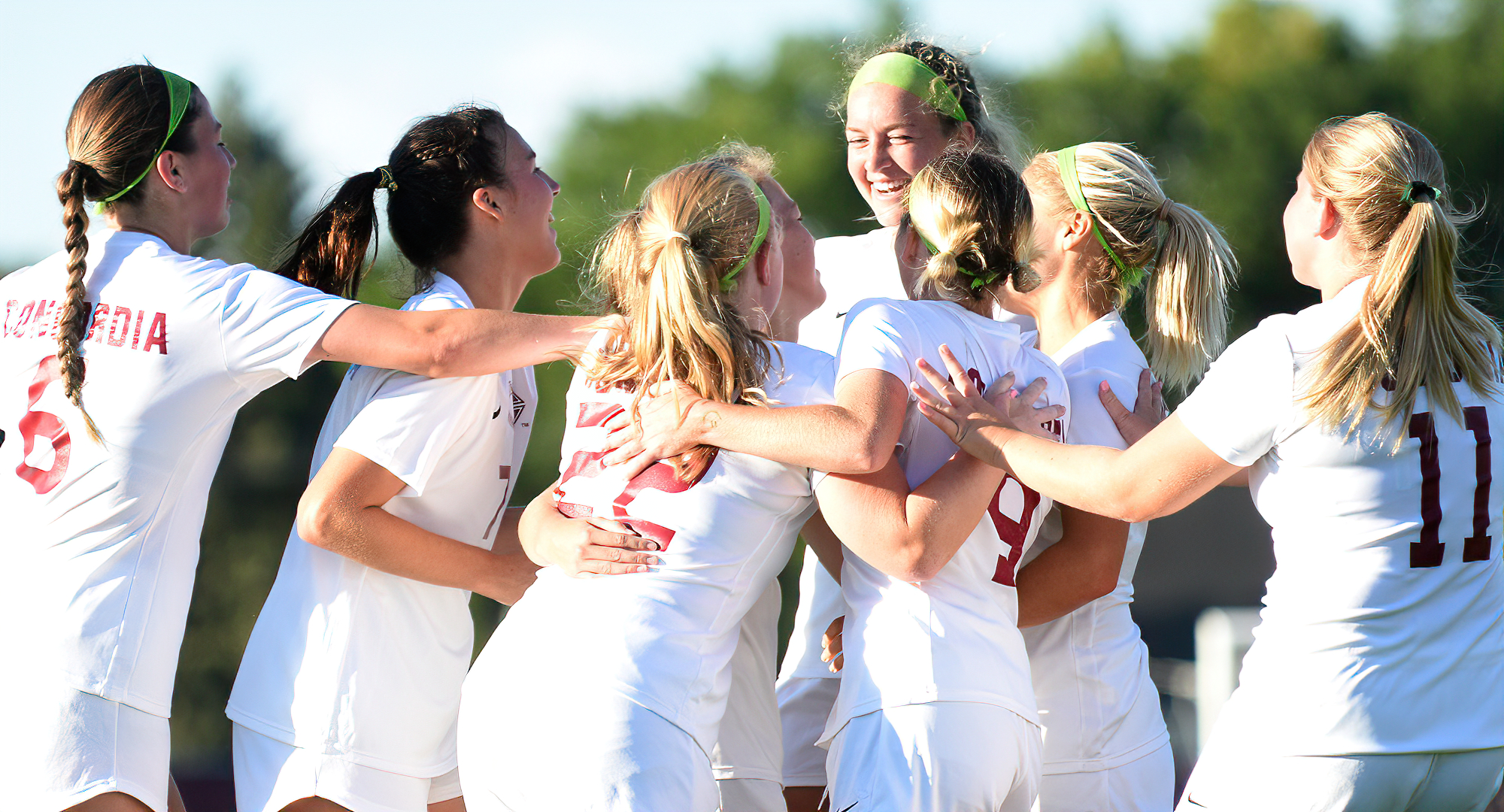 Cobber players celebrate the team's second goal of the game scored by freshman Amber Weibye in Concordia's 3-1 win over Minn.-Crookston.