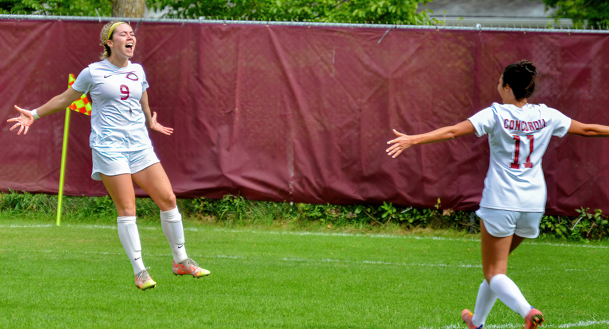 Senior Grace Lawlor celebrates her first-half, breakaway goal in the Cobbers' game with Carleton.
