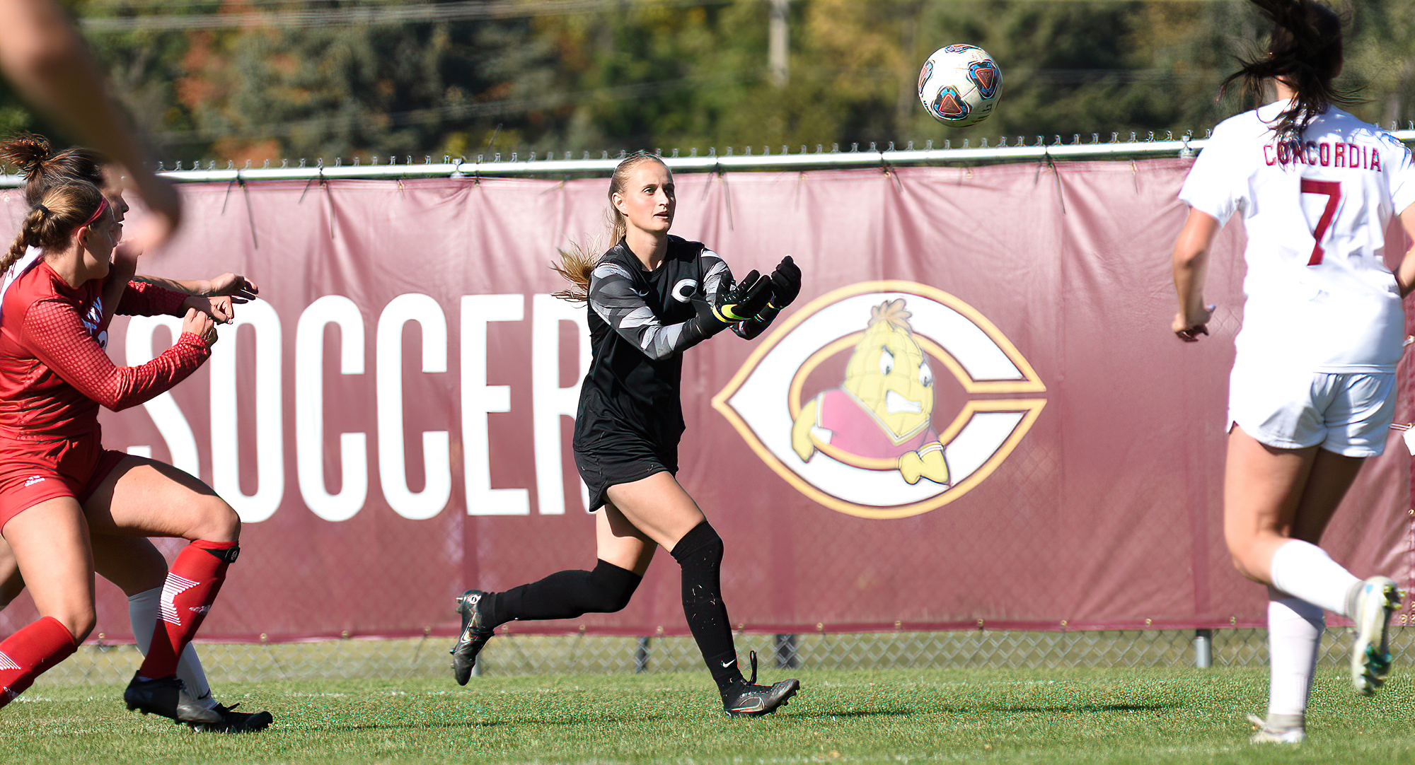 Junior goalie Bre Nelson comes out to make one of her six saves in the Cobbers' game with Viterbo.