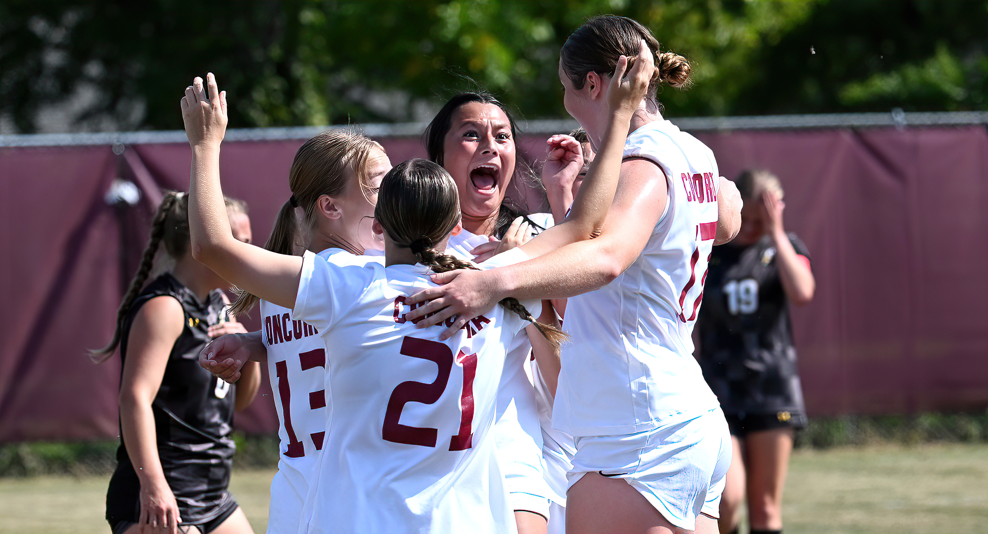 Concordia celebrates Chloe Sollom's (center) goal in the first half of its 3-0 win over Wis.-Superior.