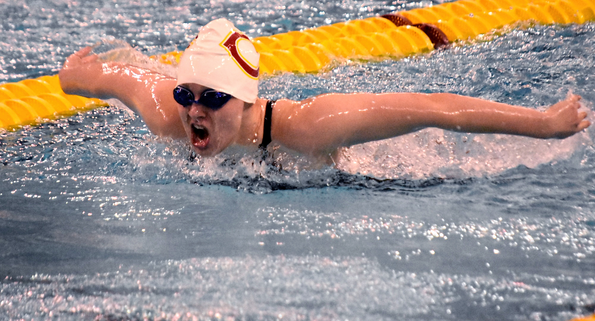 Senior Sarah Nelson cruises to the finish in the "B" finals in the 200-yard butterfly at the MIAC Meet (Photo courtesy of Matt Higgins - MIAC Office)