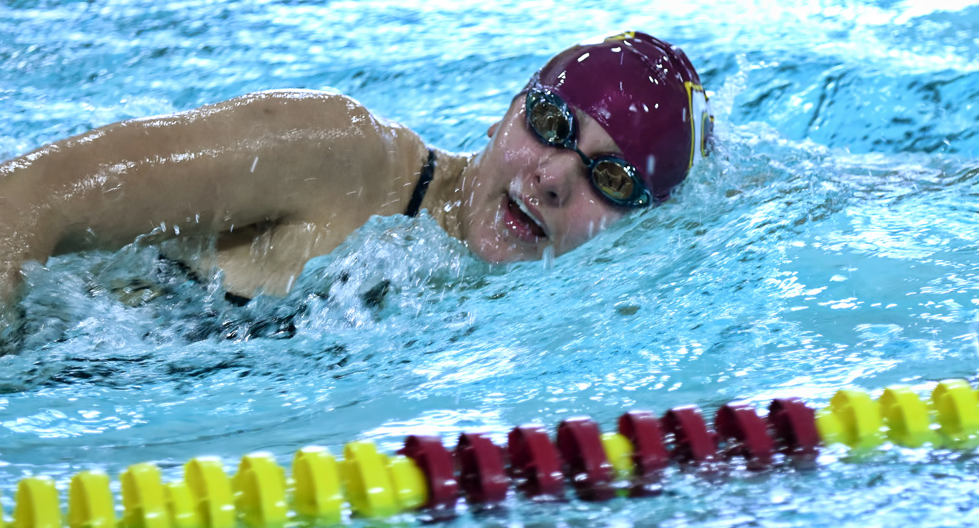 Junior Anna Backes powers through the water on her way to winning the 500-yard freestyle in the Cobbers' dual meet with Minn.-Morris.