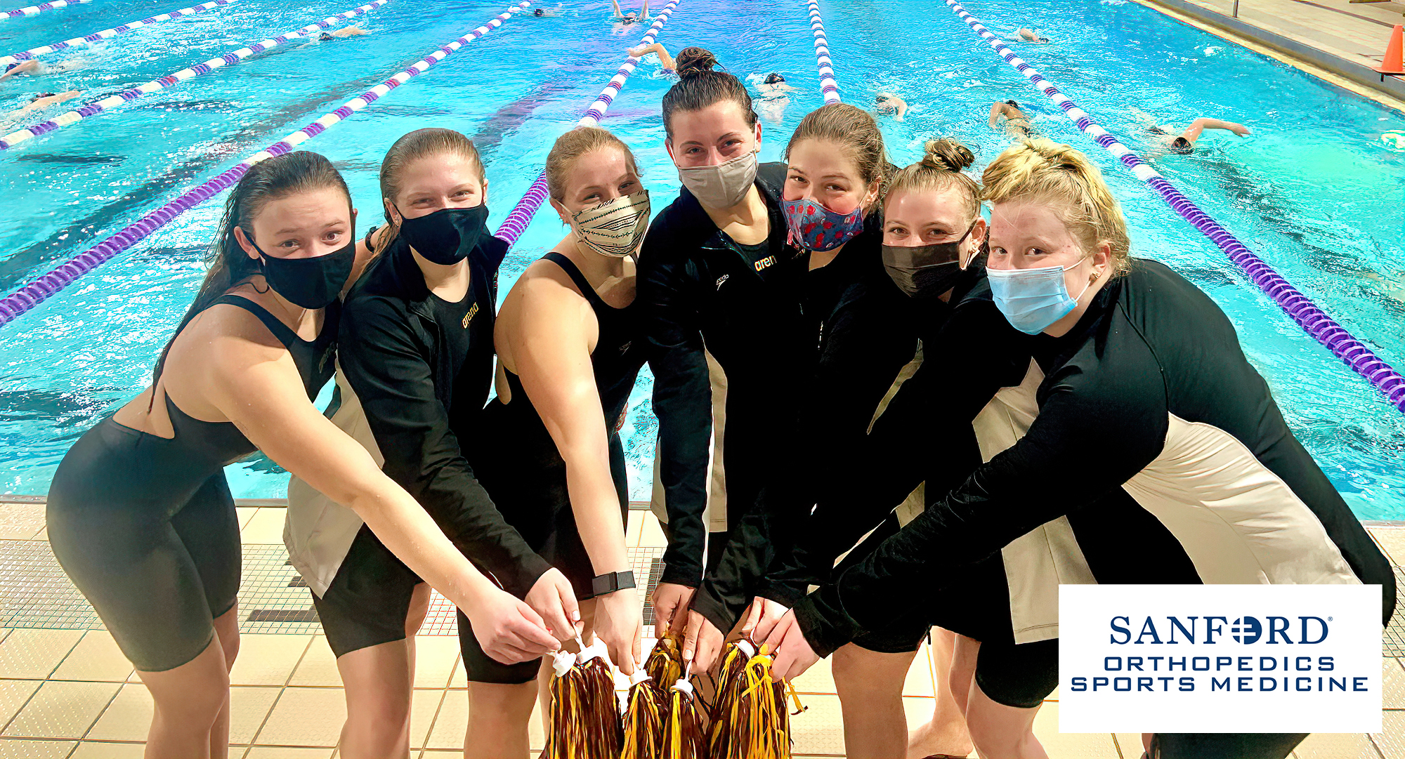 Concordia poses for a picture after their meet at St. Catherine. The Cobbers had several season-best times and won the 400-yard freestyle relay.