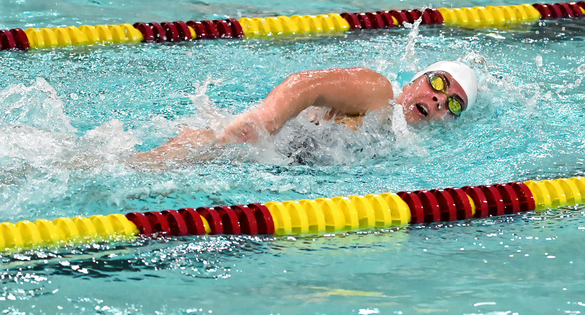 First-year swimmer Leah Enedy swims the freestyle leg of the 200-yard individual medley. She won the event with a time of 2:21.52.