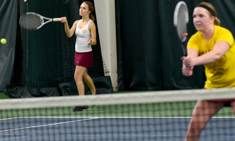Taylor Peterson (L) and Jade Haseltine lost a hard-fought battle at No.2 doubles in the Cobbers' match with St. Scholastica.