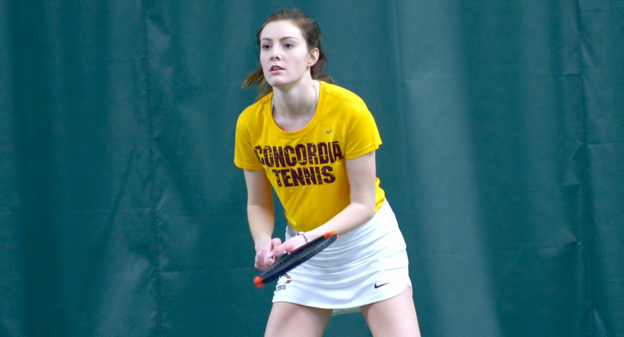 Freshman Jenna Forknell teams with Maia Wednel and lost a pair of tough 8-2 decisions against two of the top MIAC teams.