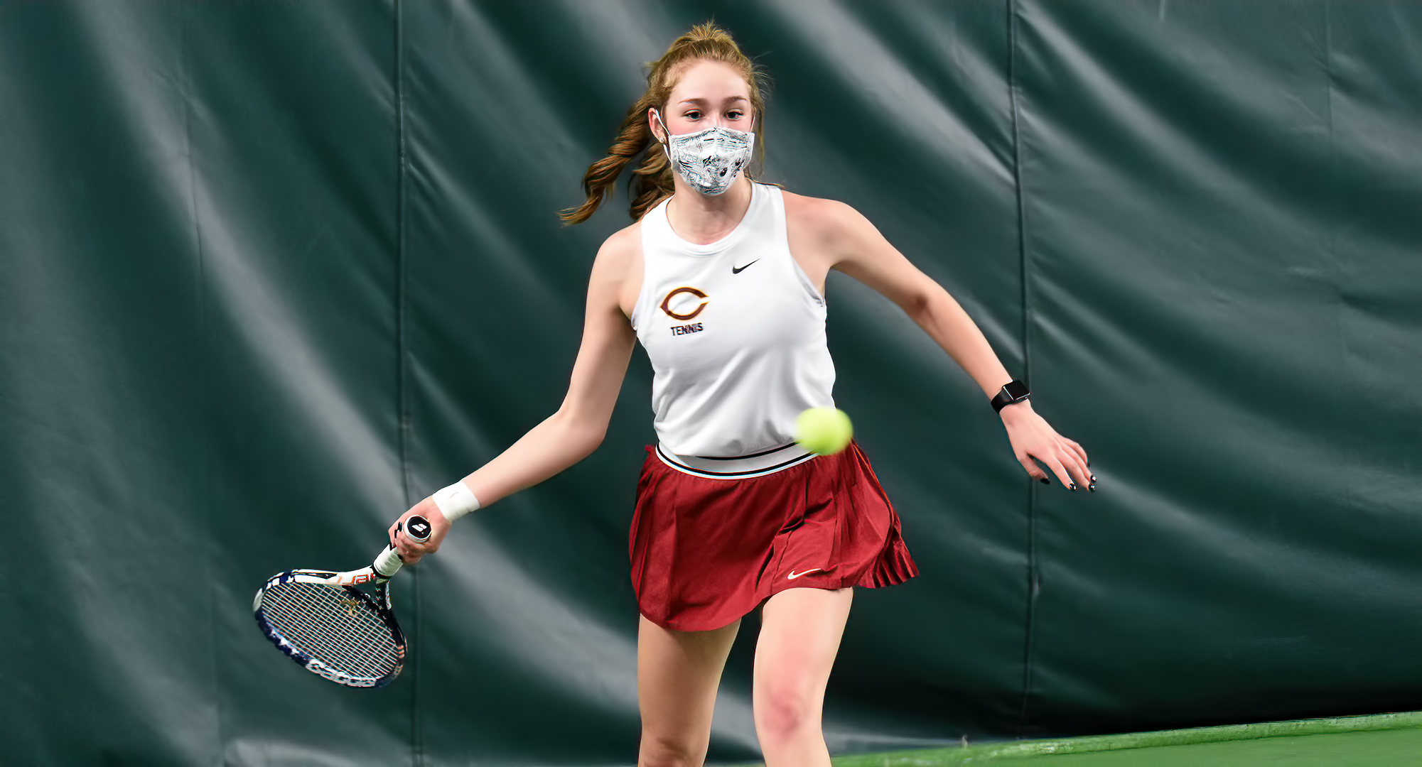 Sophomore Raquel Egge eyes a forehand return during her No.1 singles match against Gustavus on Friday.