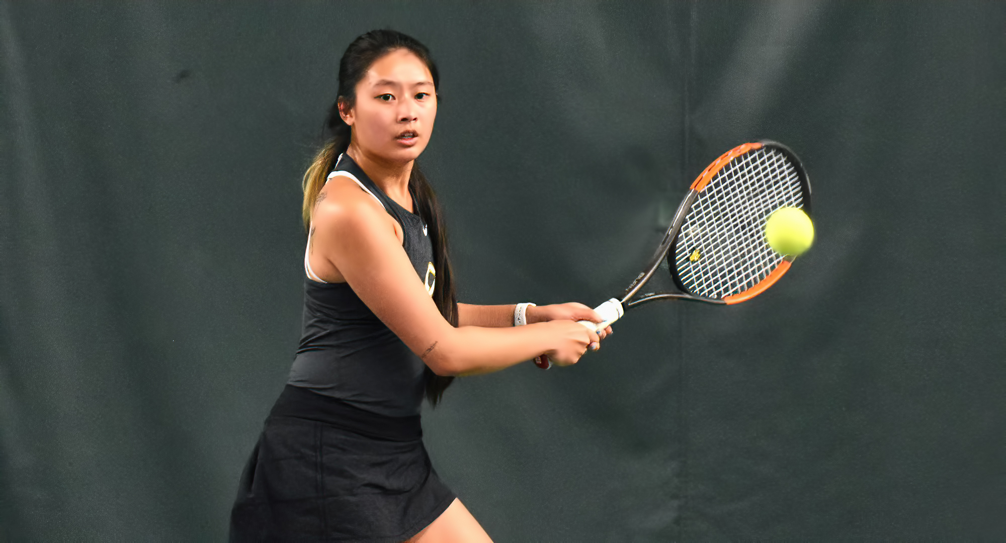 Senior Emily Savageau won both her singles and doubles bouts in the Cobber's match against St. Scholastica.