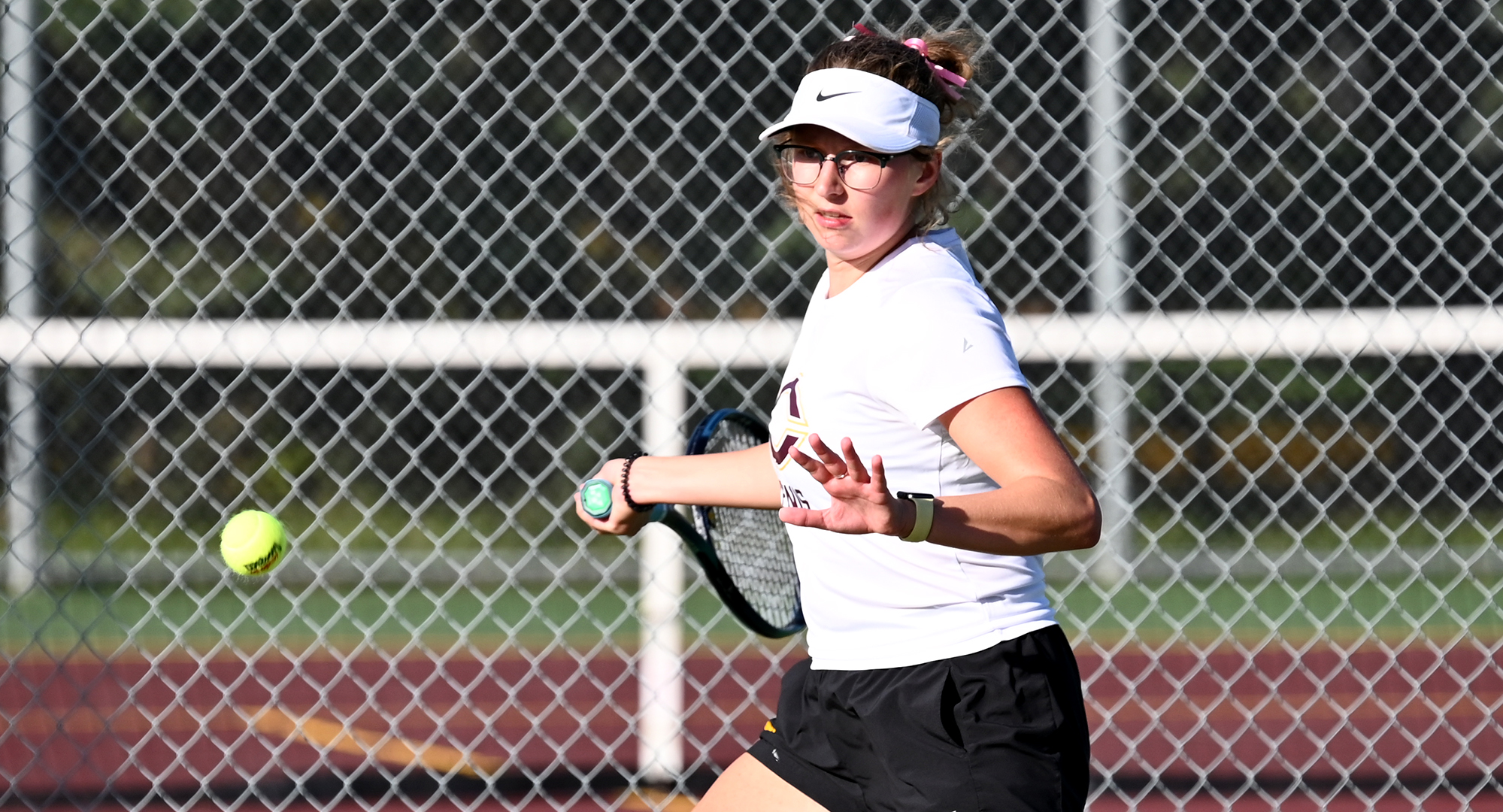 Senior Anna Hacker didn't lose a game in either of her doubles or singles matches as she helped the Cobbers post a 9-0 win at Crown.