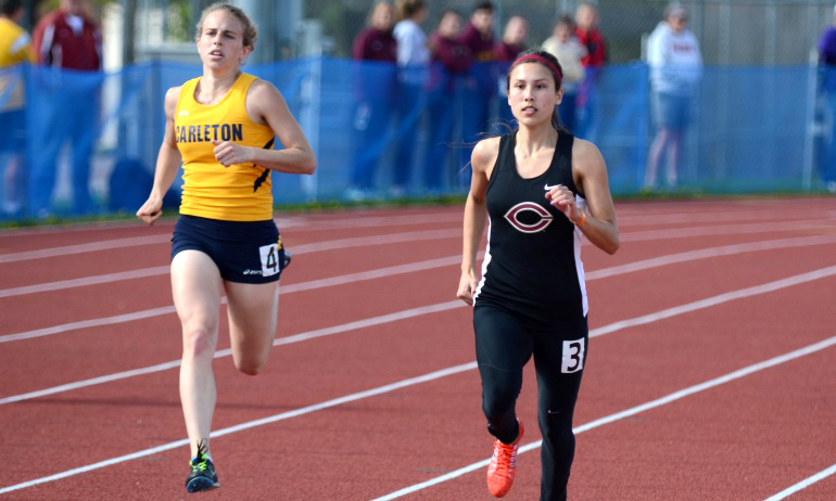 Hannah Lundstrom speeds through the prelims at the MIAC Meet. She won the 200 meters and placed third in the 400 meters.