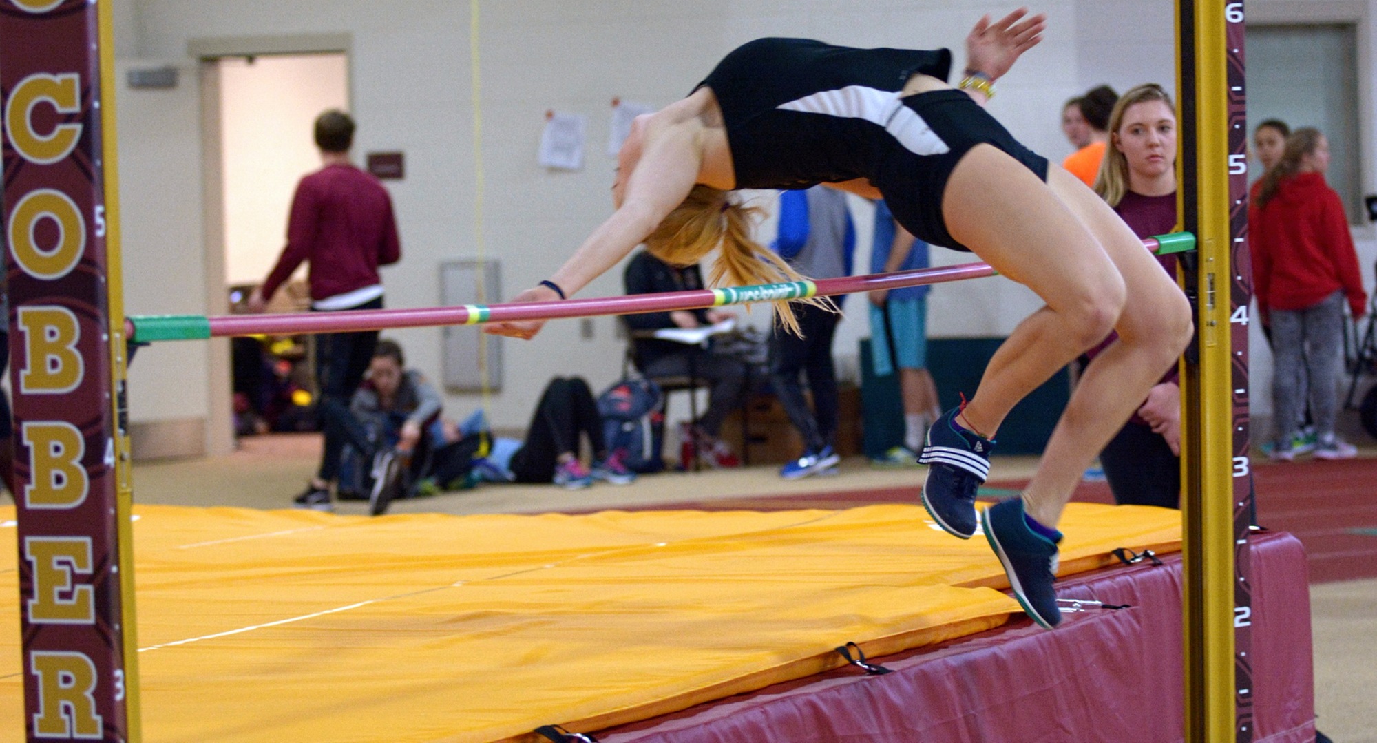 Senior Mikayla Forness clears the bar in the high jump at the season-opening Cobber Duals Meet.