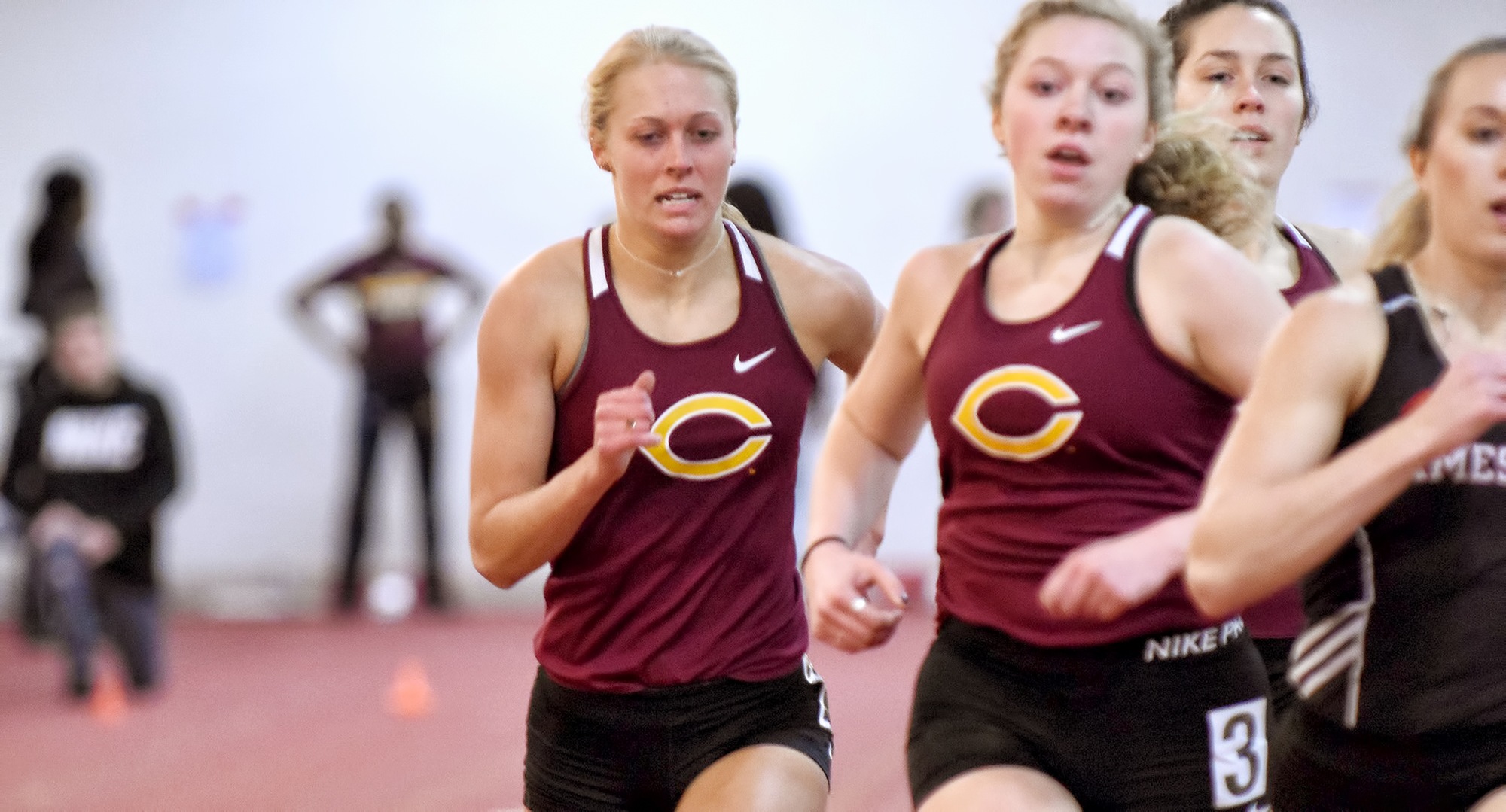 Miriah Forness (L) and Josie Herrmann both put up Top 15 school times in the 800 meters at the UND Tune-Up Meet.