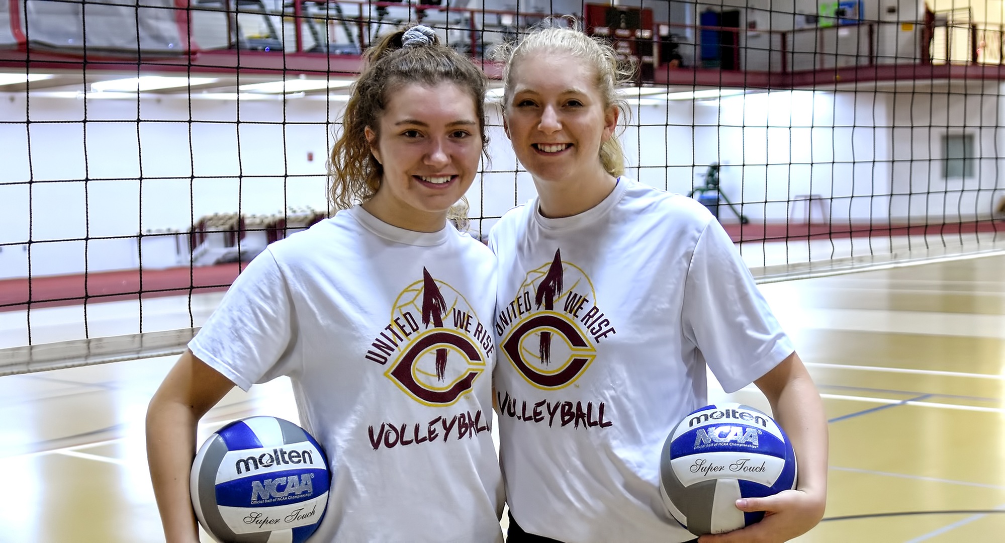 Sisters Brook (L) and Brianna Carney are members of the Cobber volleyball team.