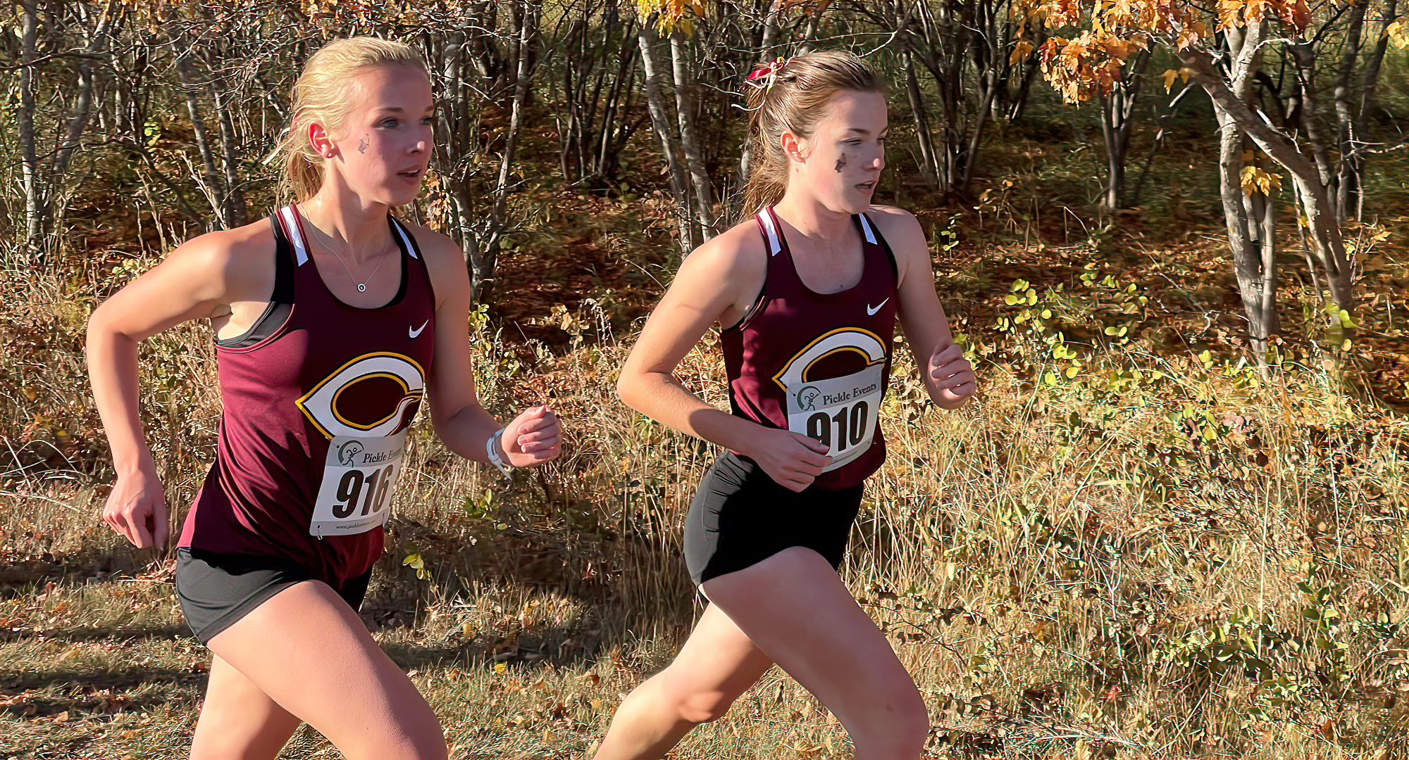 Amelia Landsverk (R) and Emily Rugloski race together at the Jimmie Invitational. Landsverk led the Cobbers with a a time of 19:54.3