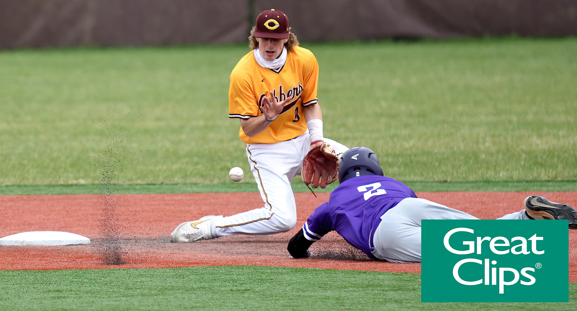 Shortstop Thomas Horan looks to corral a throw down from the catcher and put the tag on a would-be St. Thomas base stealer in Game 2 of the Cobbers' DH with UST.