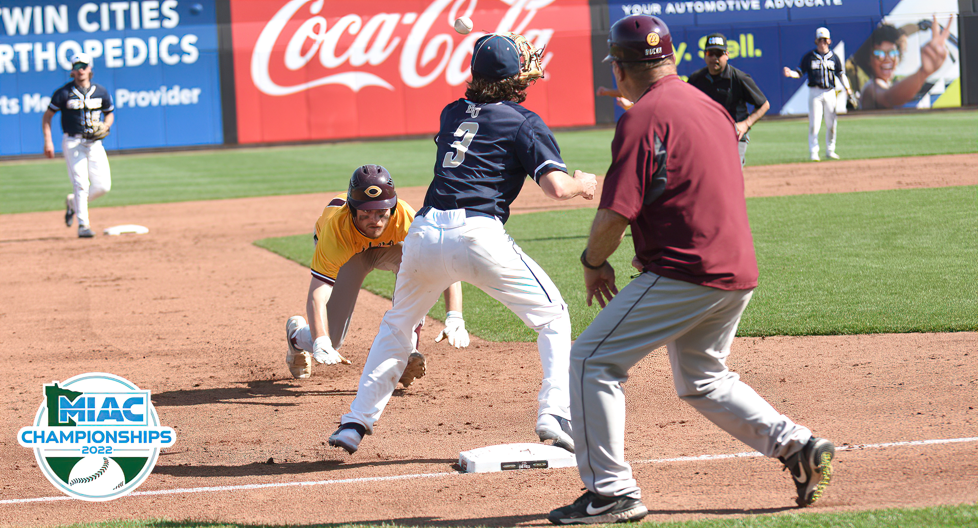 Wyatt Gunkel slides into third base inning during the fifth inning of the Cobbers' MIAC playoff game against Bethel.