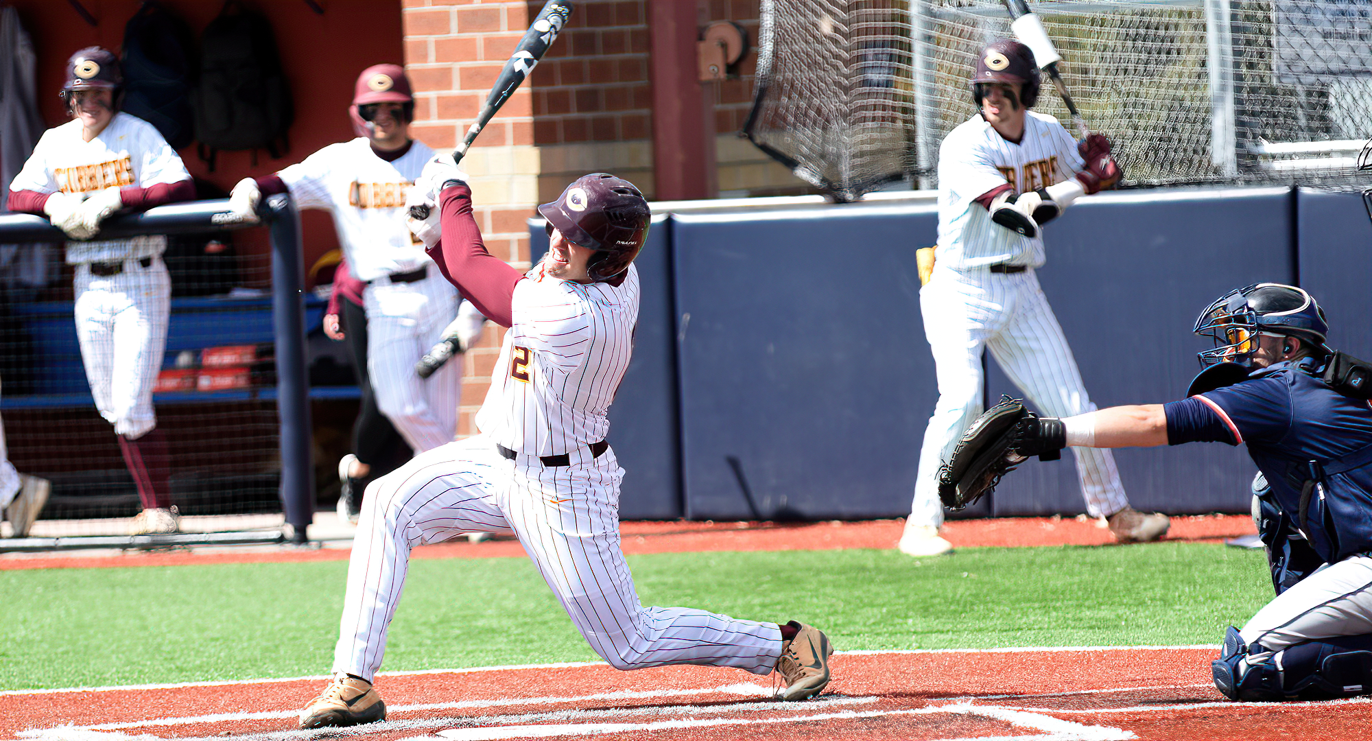 Matt Gruber connects on the first of his two home runs in the Cobbers' sweep over Macalester. He was 5-for-7 and posted 8 RBI on the day.