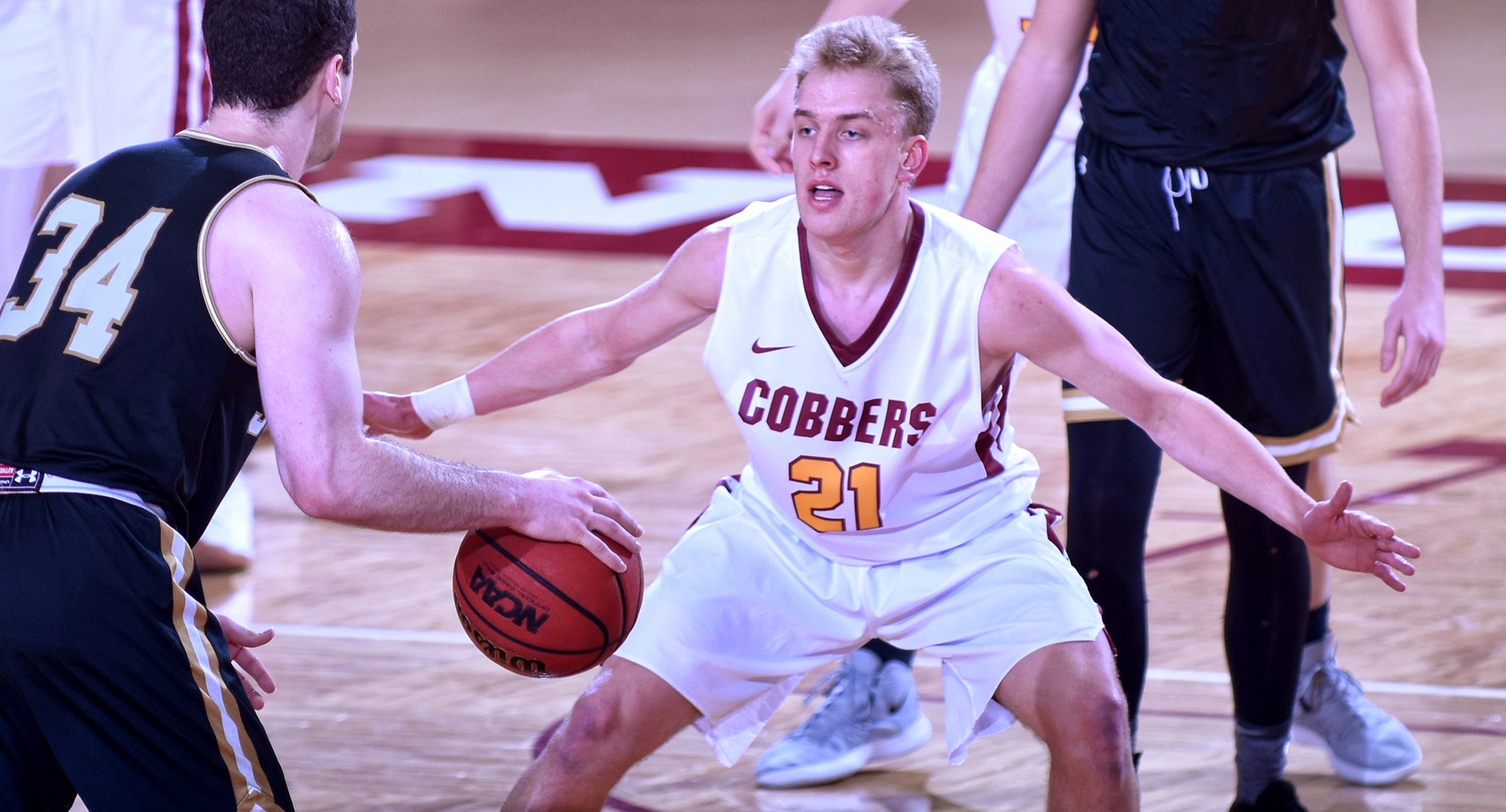 Sophomore David Birkeland scored a career-high 10 points and didn't miss a shot in the Cobbers' game at #4 St. Thomas.