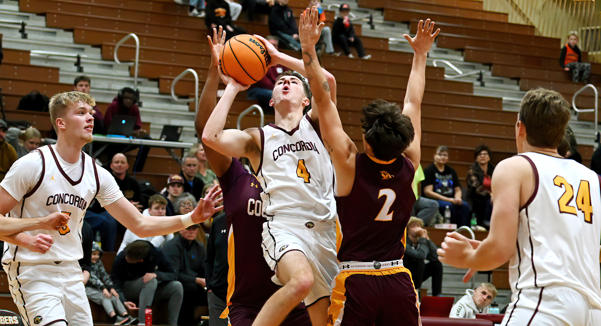Zach Jackson drives to the hoop in the Cobbers' 27-point win over Minn.-Morris. He finished with a career-high 19 points.