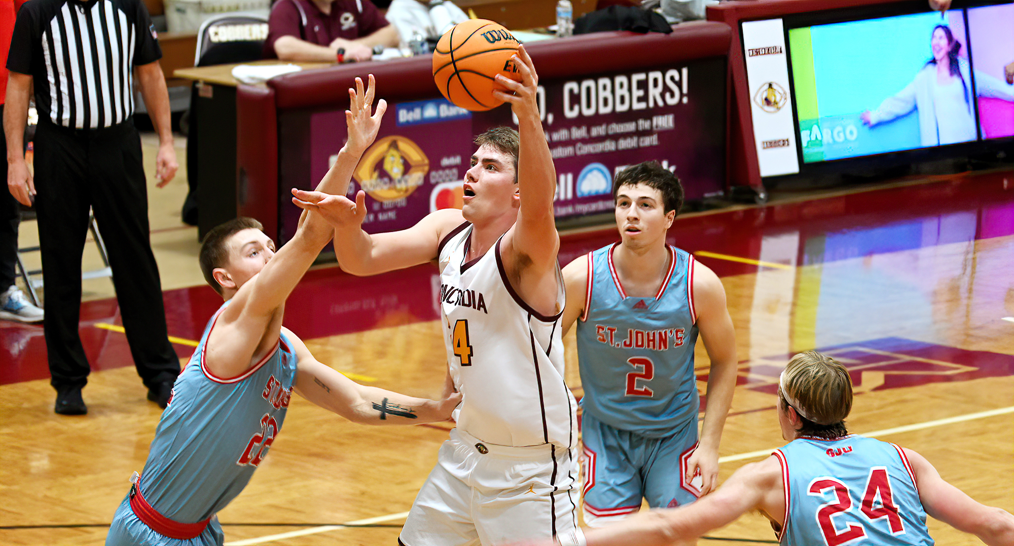 Jackson Loge goes up for two of his team-high 20 points in the Cobbers' game with St. John's. Loge also had three assists and two blocks.