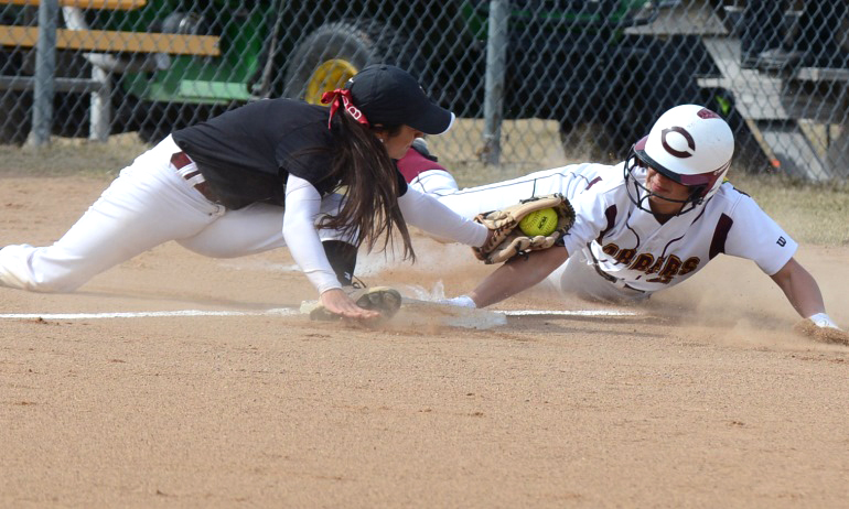Madison Little tries to avoid the tag on a stolen base attempt in the first game vs. VCSU. Little went 4-for-7 on the day.