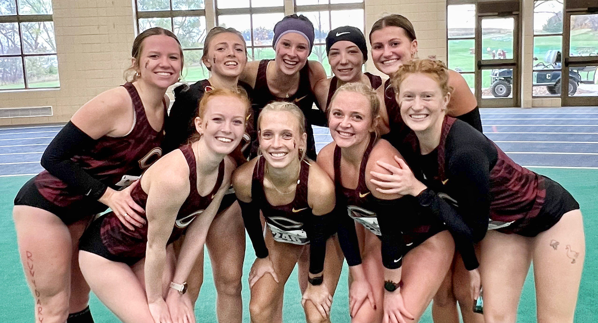 The Cobber crew at the MIAC Meet poses for a picture. They had five runners finish in the Top 58 with all five finishing within 14 seconds of one another.